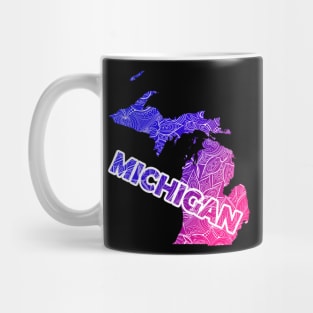 Colorful mandala art map of Michigan with text in blue and violet Mug